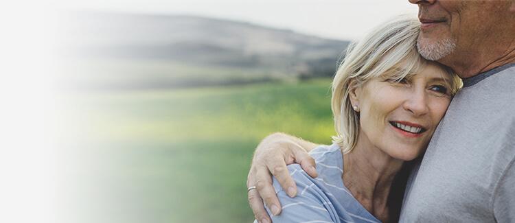 Woman Hugging & smiling