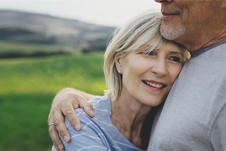 Woman Hugging & smiling