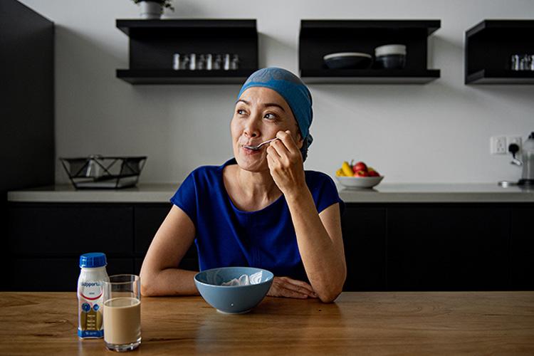 Cancer patient kelly having breakfast 