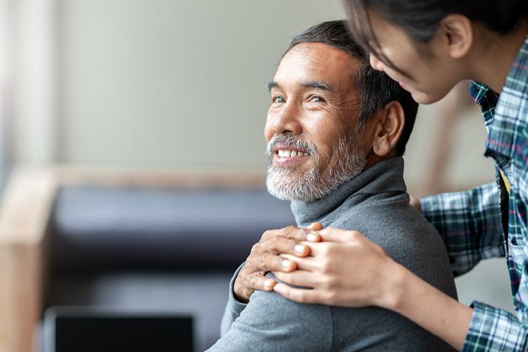 Senior smiling at woman 