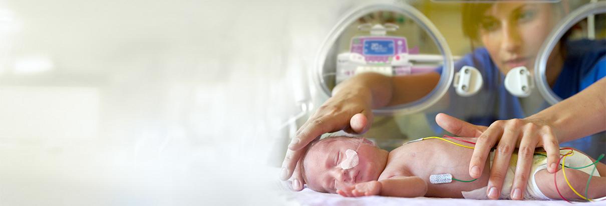 Nurse caring for pre-term baby