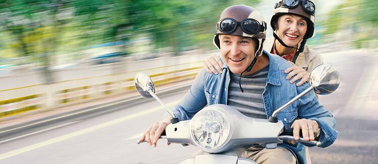couple on vespa