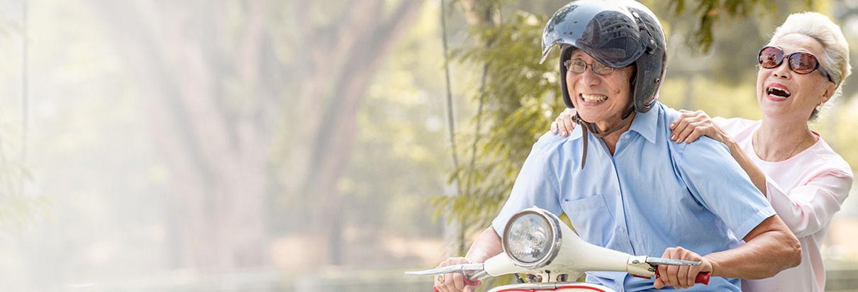Elderly on vespa