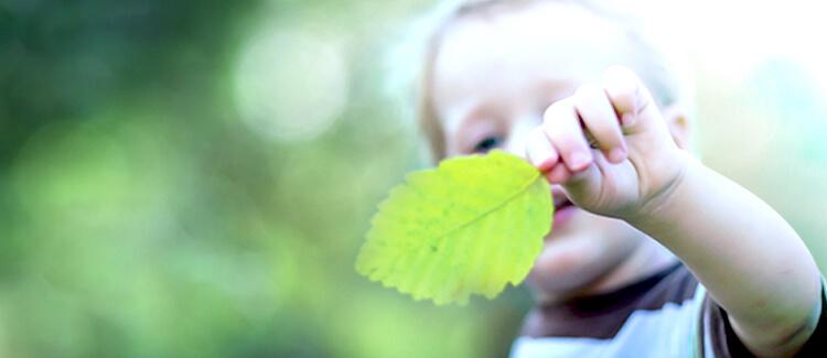 Boy with leaf