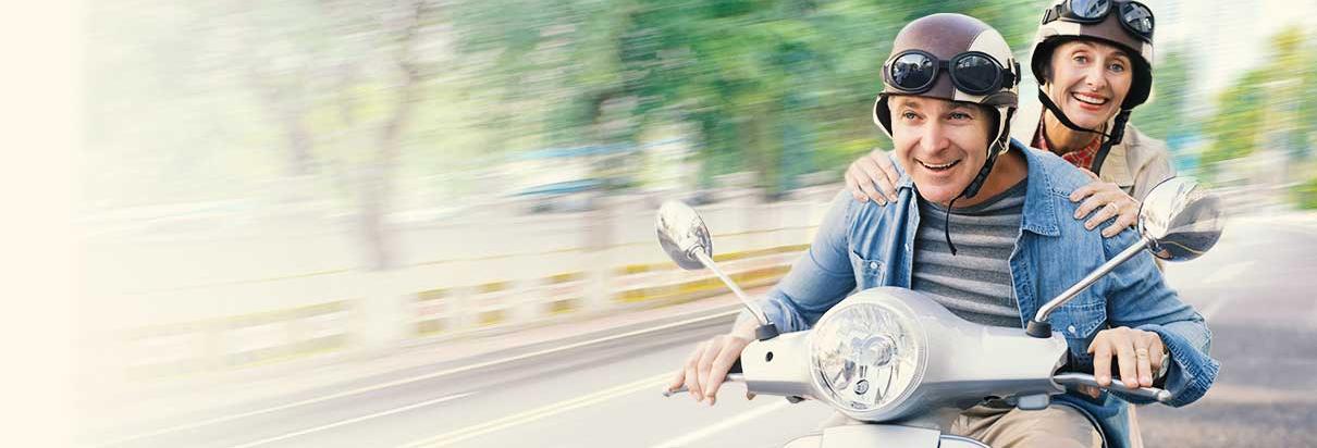 couple on a vespa